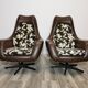 Mid century swivel armchairs