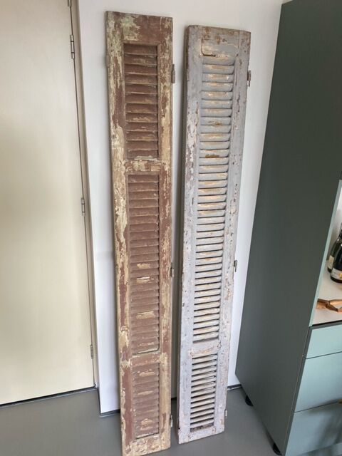 Old wooden french louvre shutters