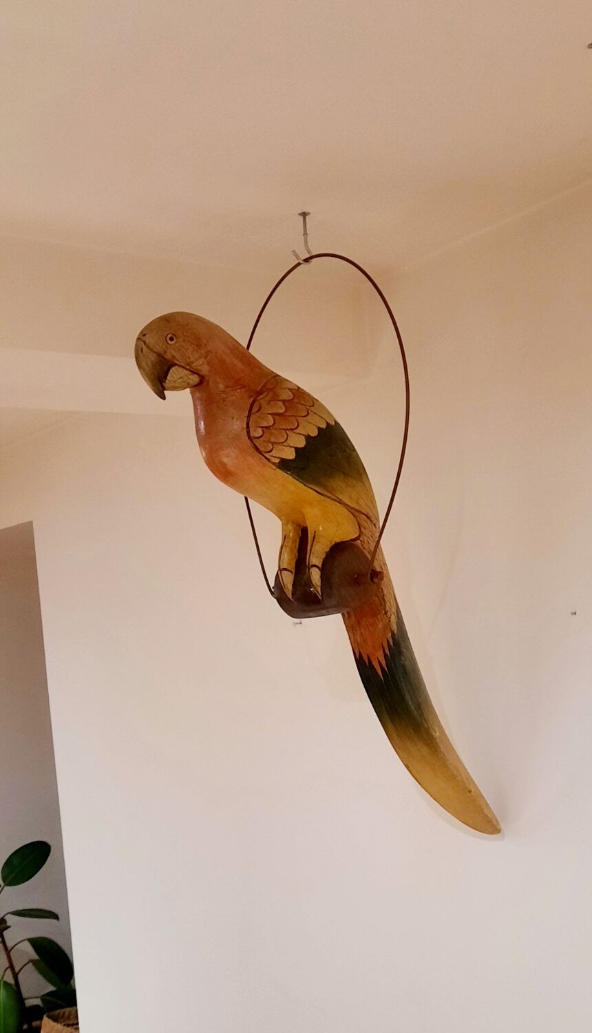 Wooden parrot suspension
