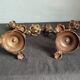 Pair of antique candlesticks in cherub bronze