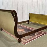 Lit Empire en acajou début XIXème à cols de cygnes et pieds griffes