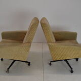 Pair of mid-century swivel armchairs with wheels 1970's