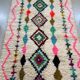 Moroccan Berber rug in ecru with multicoloured diamonds and bright pink – 240 × 139
