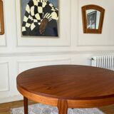 Round extendable rosewood table from the 70s