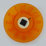 Guzzini orange wall clock from the 1980s