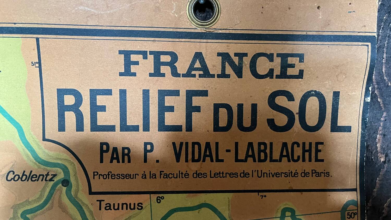 Old cardboard school map of France
