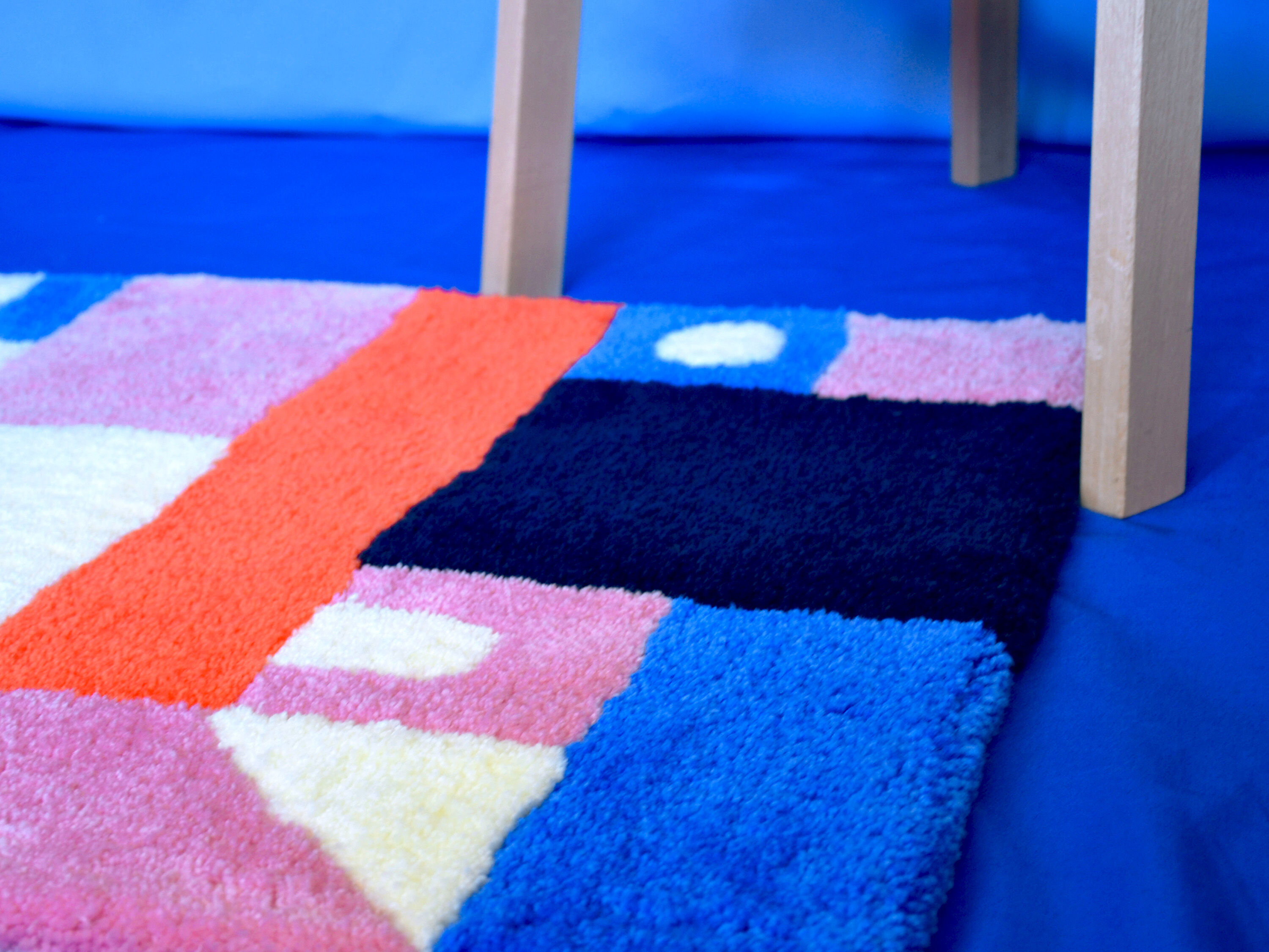 Tapis tufté rectangulaire géométrique 90x60cm