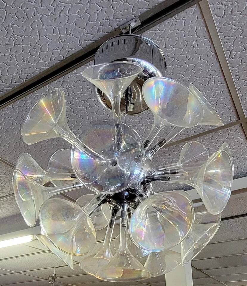 According to Goffredo Reggiani: trumpet chandelier or champagne flute