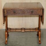 Antique extendable coffee table circa 1880 in solid walnut.