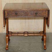 Antique extendable coffee table circa 1880 in solid walnut.