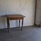 Rustic brown solid wood dining table, 1950s.