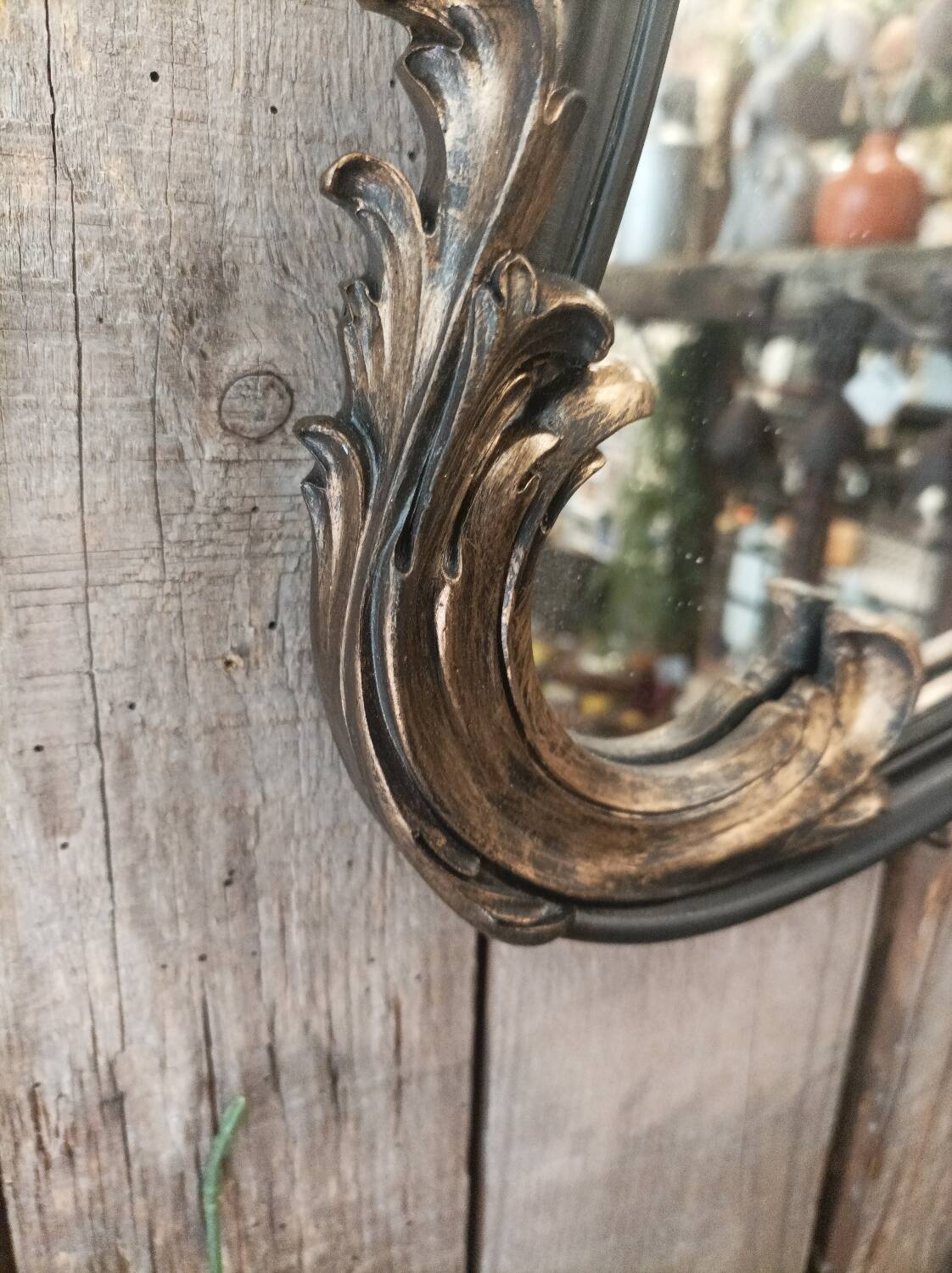 Black and gold baroque mirror