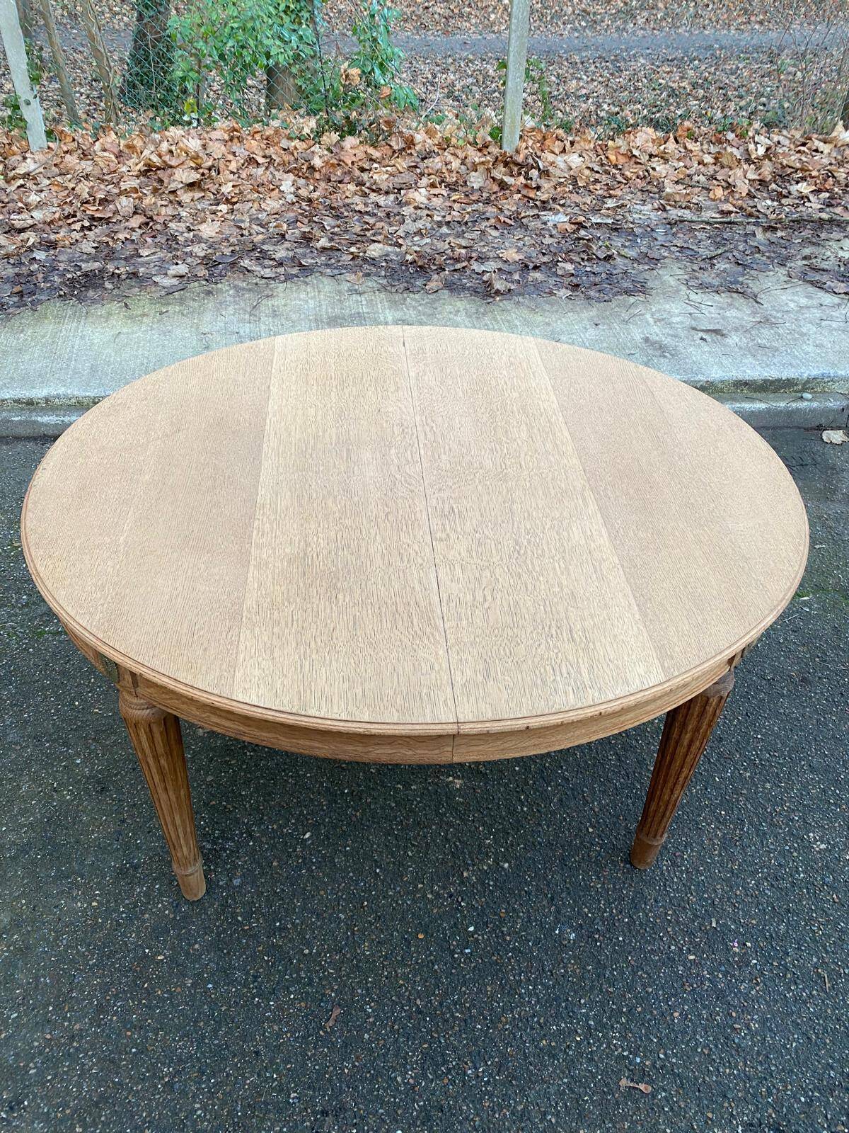 Renovated round Art Deco dining table in solid oak, 1950, 230cm extendable.