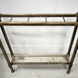 Brass and sheet metal umbrella stands from the 20th century.