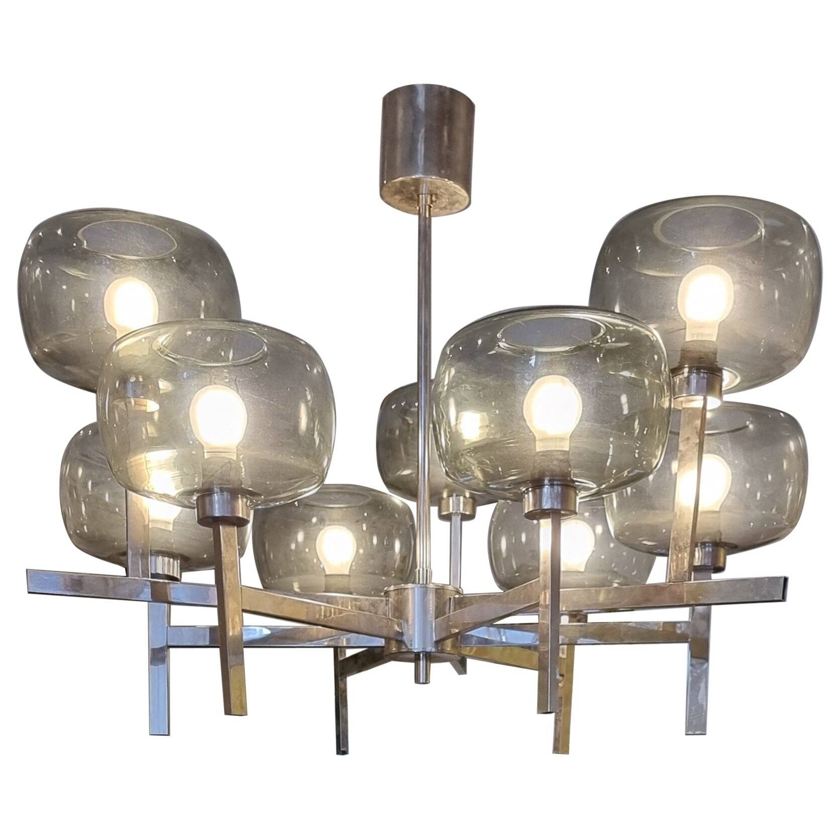 Timeless modern Scandinavian / mid-century chandelier in chrome and smoked glass.