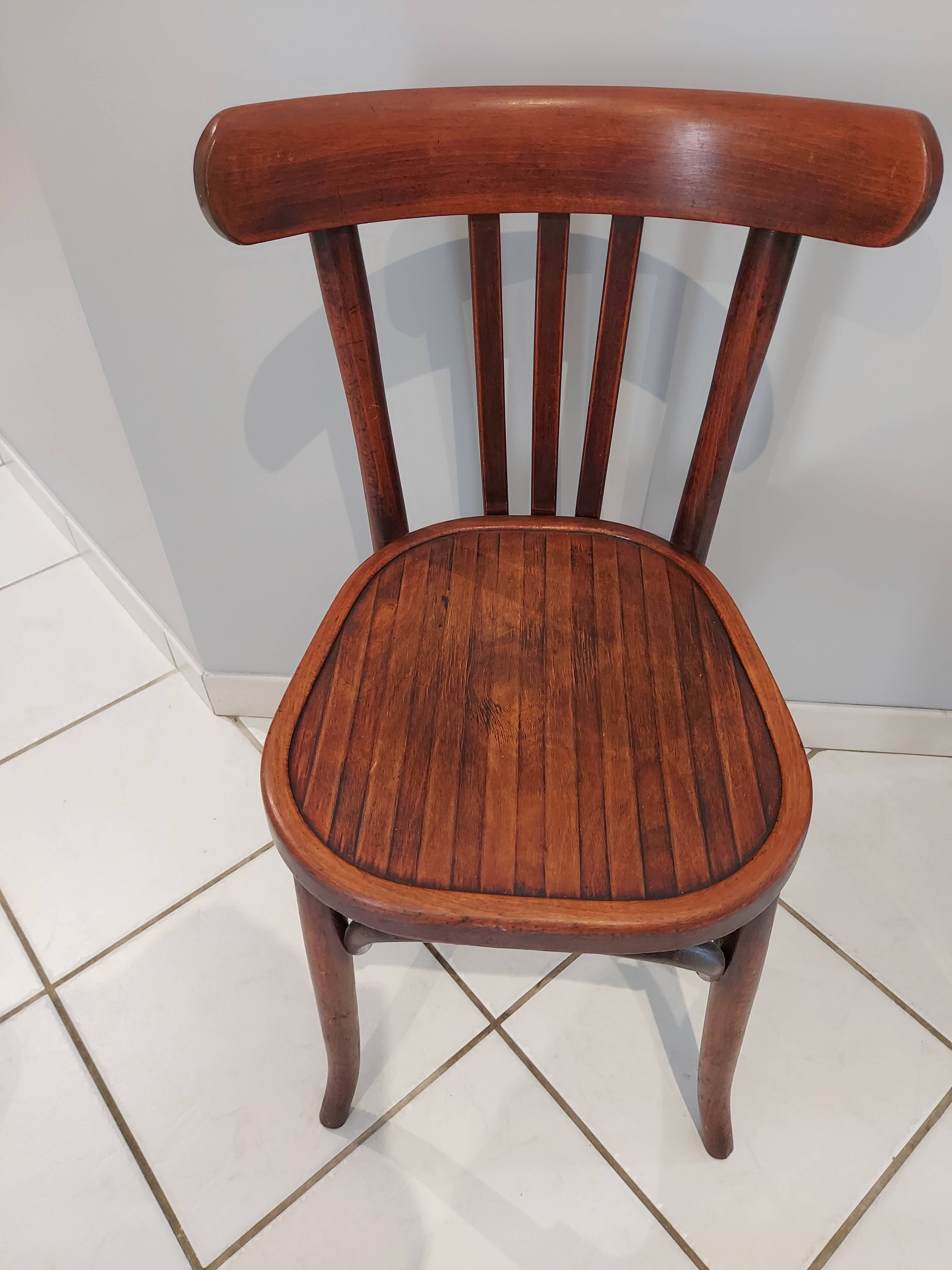 Suite of 12 chairs of bistrot Baumann 1940s