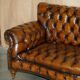 Victorian Chesterfield canapé in hand-dyed serpentine leather.