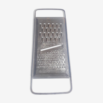 Antique metal cheese grater