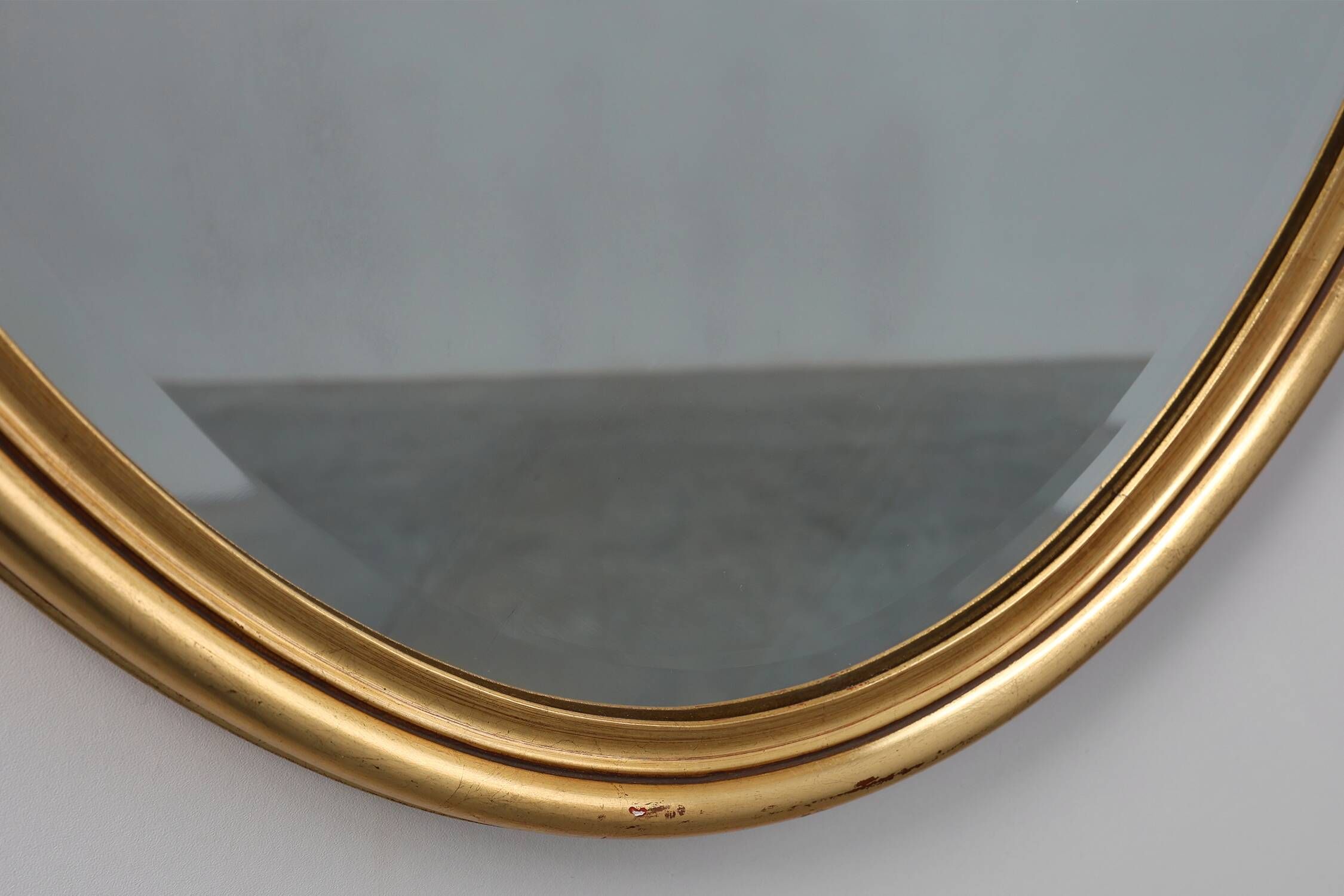 20th century Louis XVI style mirror in gilded wood, France