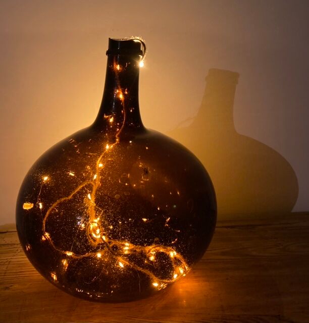 Old amber demijohn