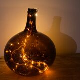 Old amber demijohn
