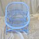 Blue painted rattan armchair
