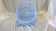 Blue painted rattan armchair