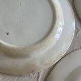 7 flat plates made of ironstone.