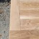 Solid oak farmhouse table in raw wood