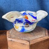 Multi-layer glass ashtray with metallic oxide inclusions.