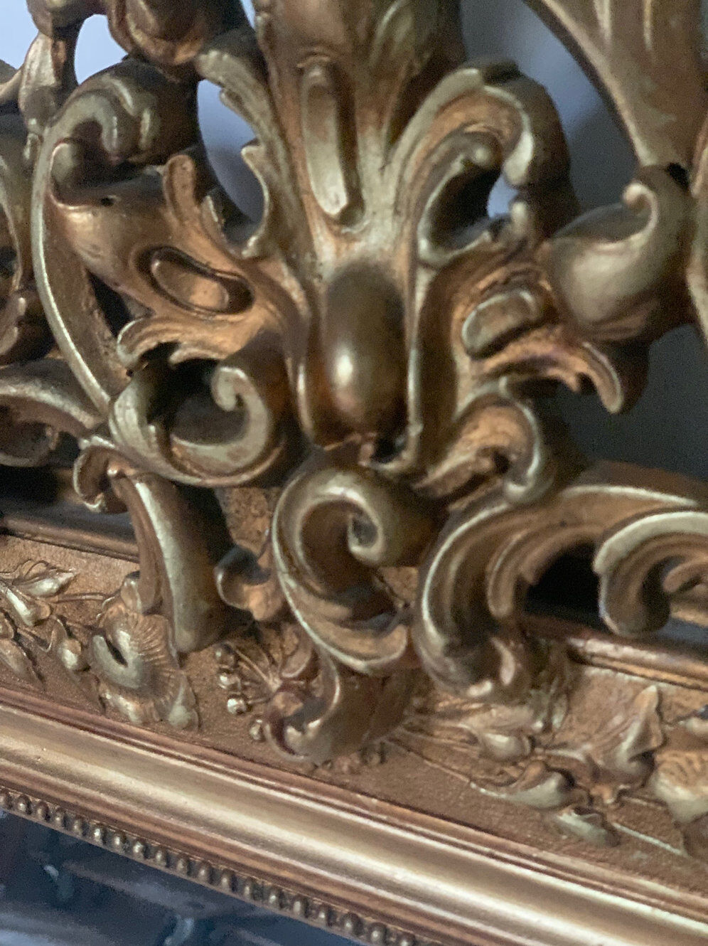 Gilded fireplace mirror with pediment