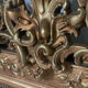 Gilded fireplace mirror with pediment