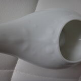 Old white porcelain pourer