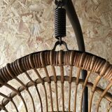 Vintage rattan hanging chair with its stand.