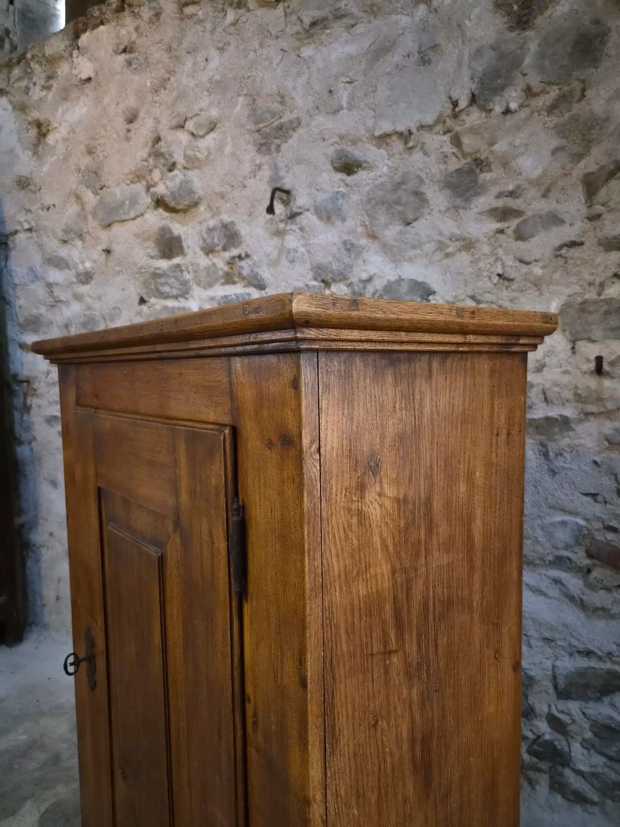 French antique oak wardrobe with one door, 18th century.