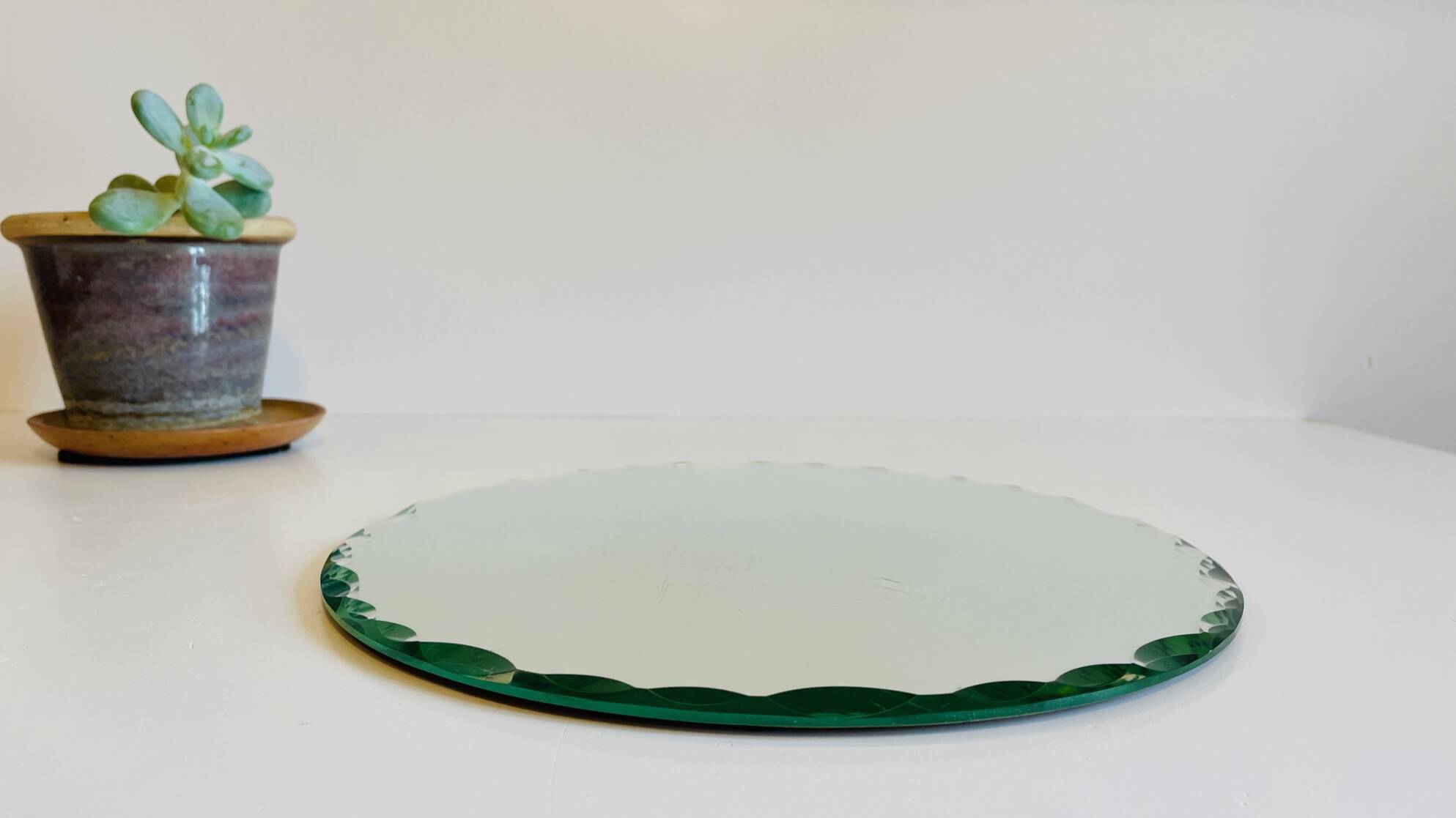 Vintage round and beveled table mirror