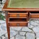 Elegant Louis XVI style mahogany flat desk from the 20th century