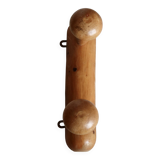 Antique wooden coat rack with two round hooks