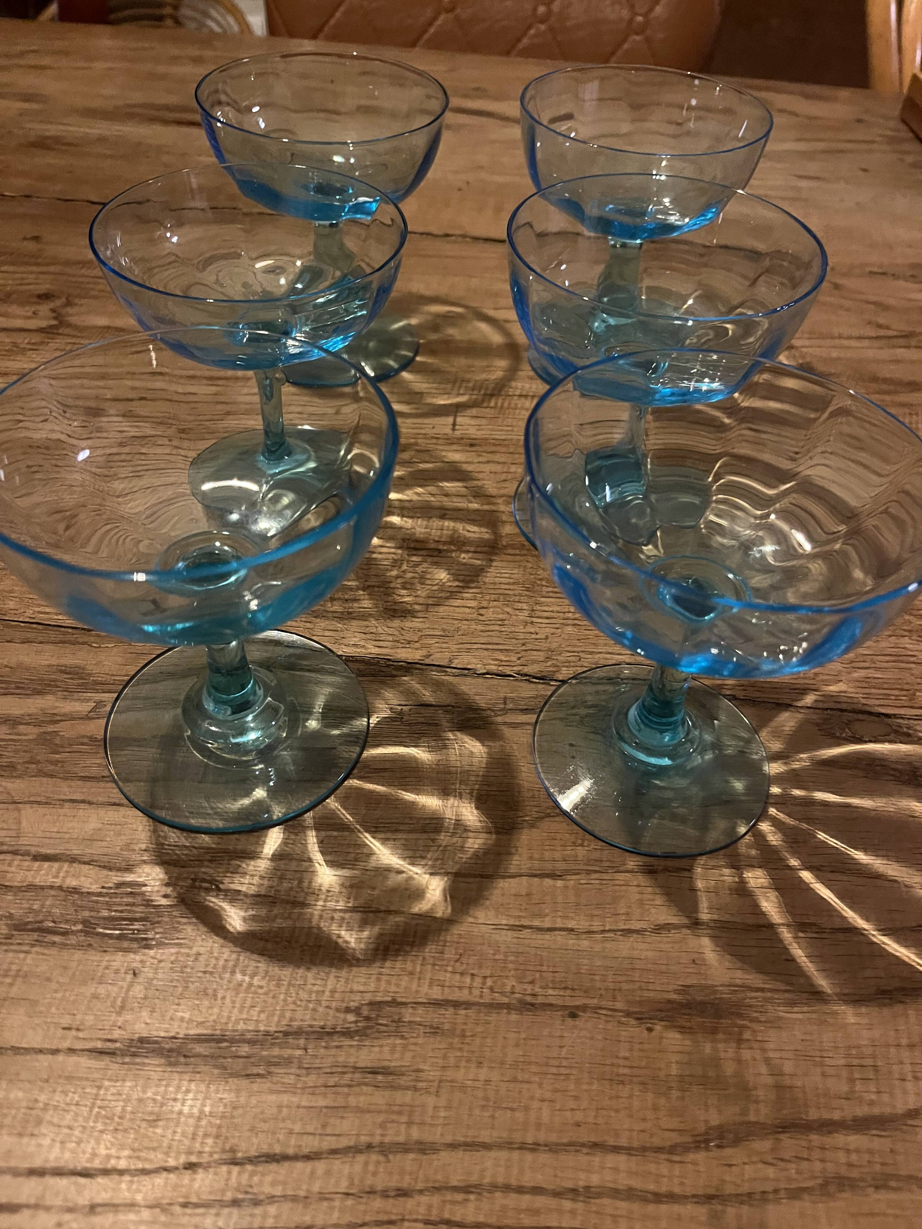 Champagne coupes in outline