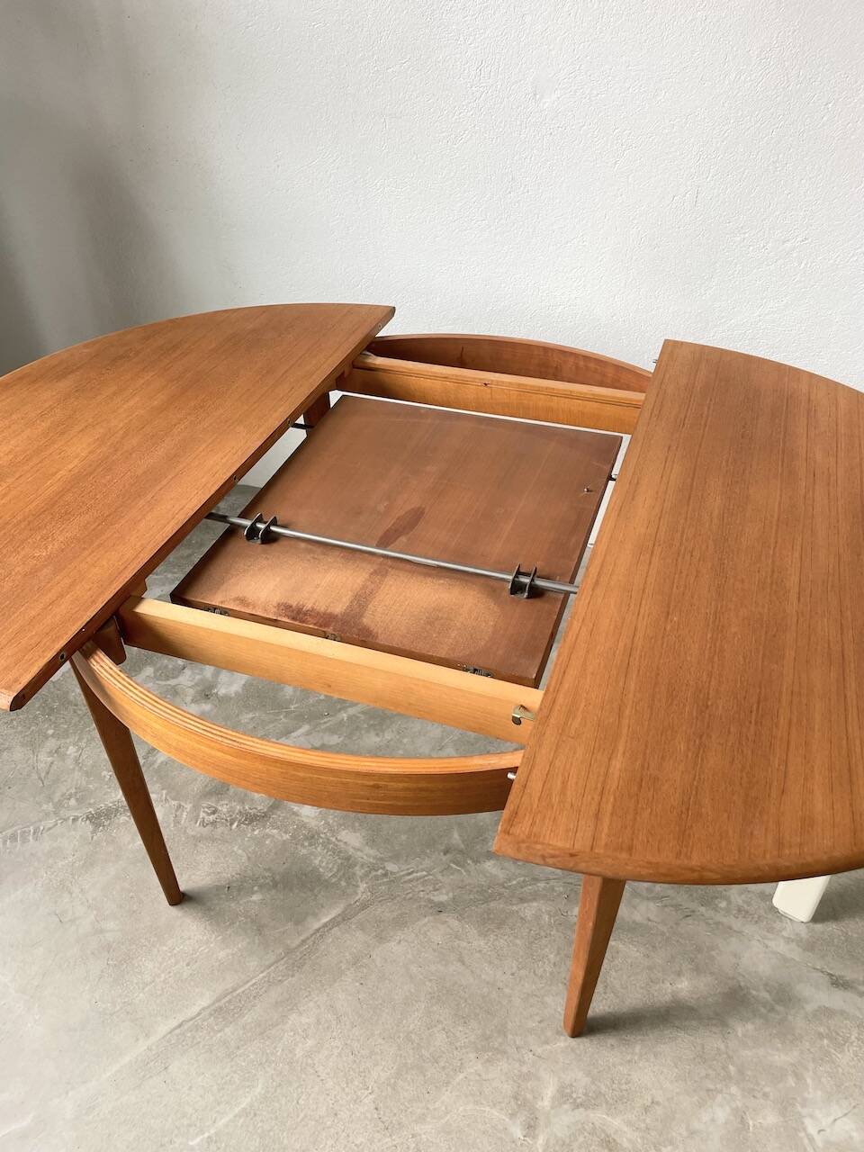 Scandinavian round teak table with extension