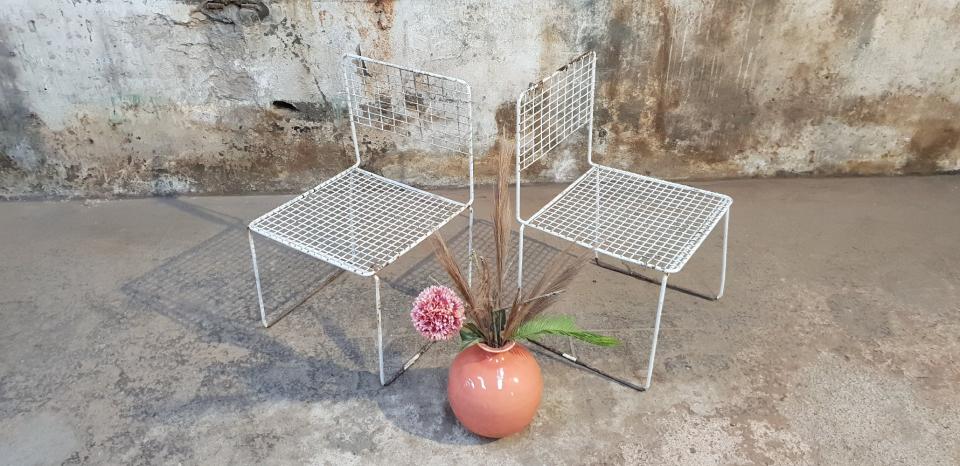Two vintage metal chairs