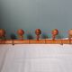 Bamboo-like wall coat rack with 5 mushroom hooks