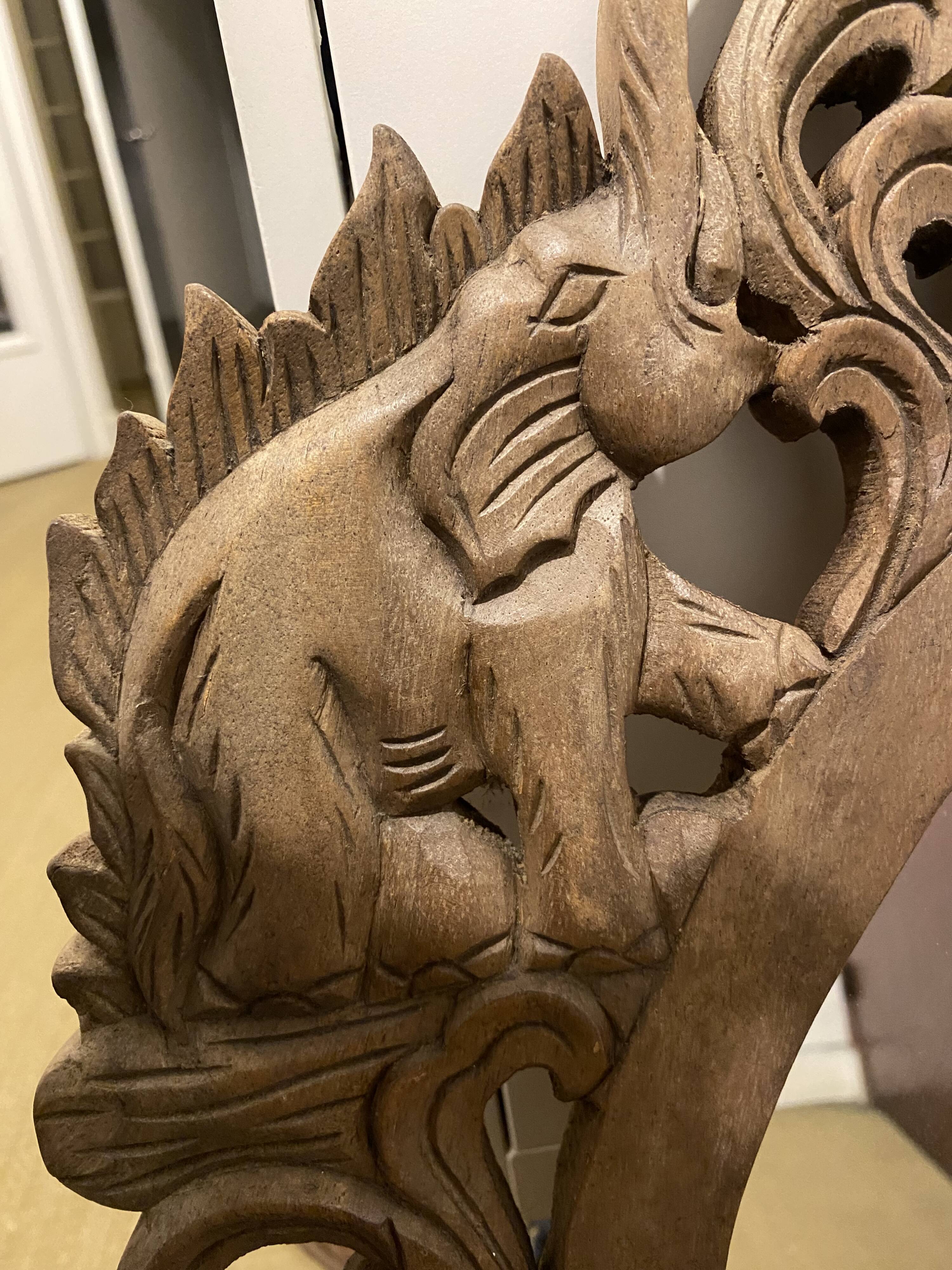 Carved mirror with integrated shelf