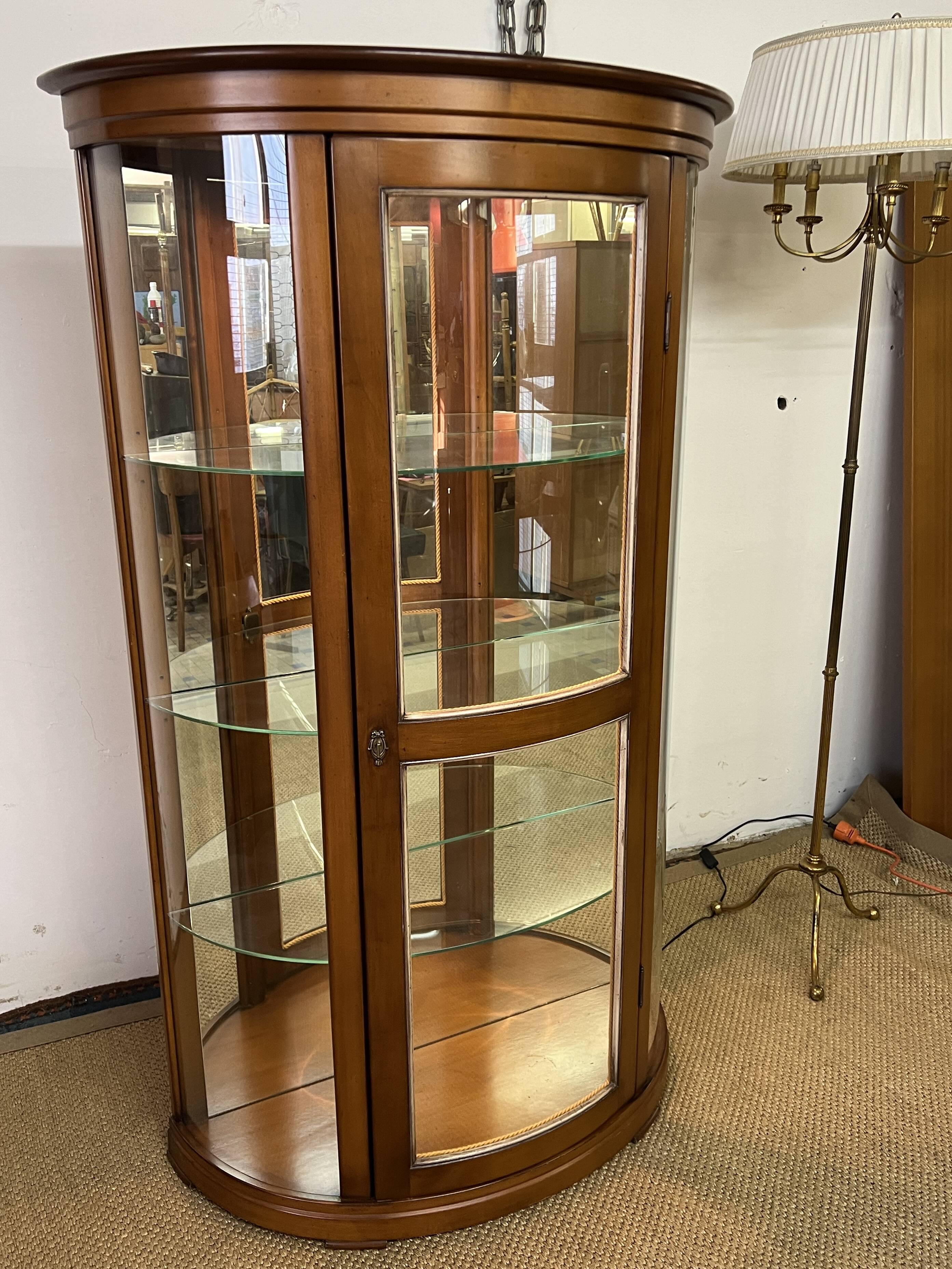 Wooden display case and half-moon mirror