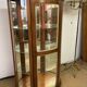 Wooden display case and half-moon mirror