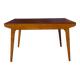 Extendable table, compass legs