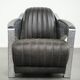 Cow leather aviator design armchair finished with aluminium and rivets