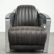 Cow leather aviator design armchair finished with aluminium and rivets
