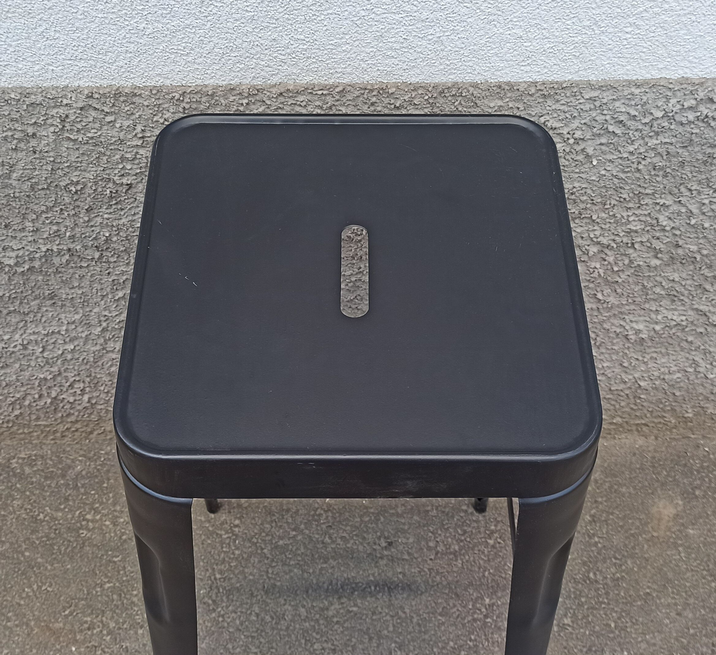 Pair of black metal stools