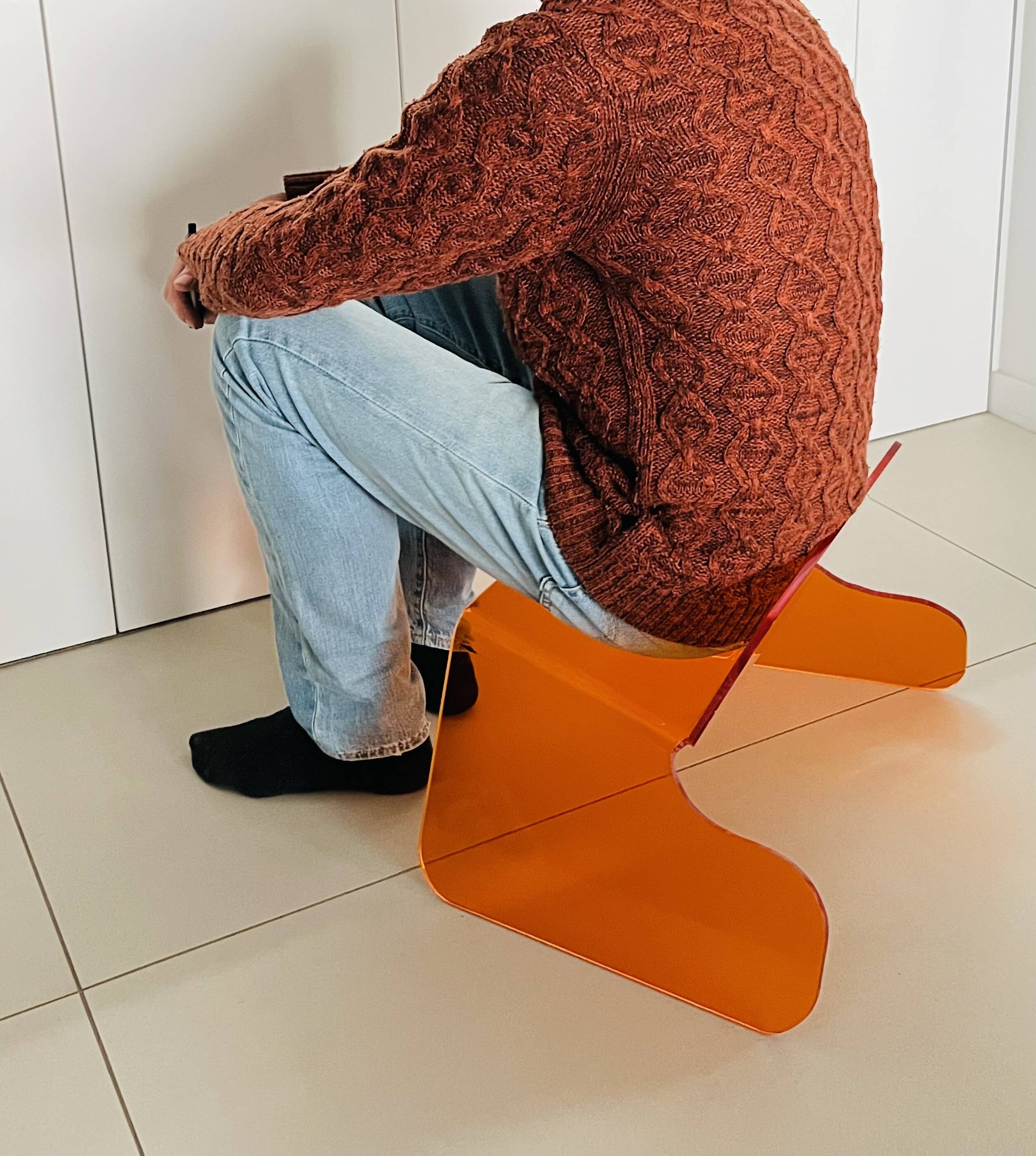 Orange plexiglass chair, 1970s France.